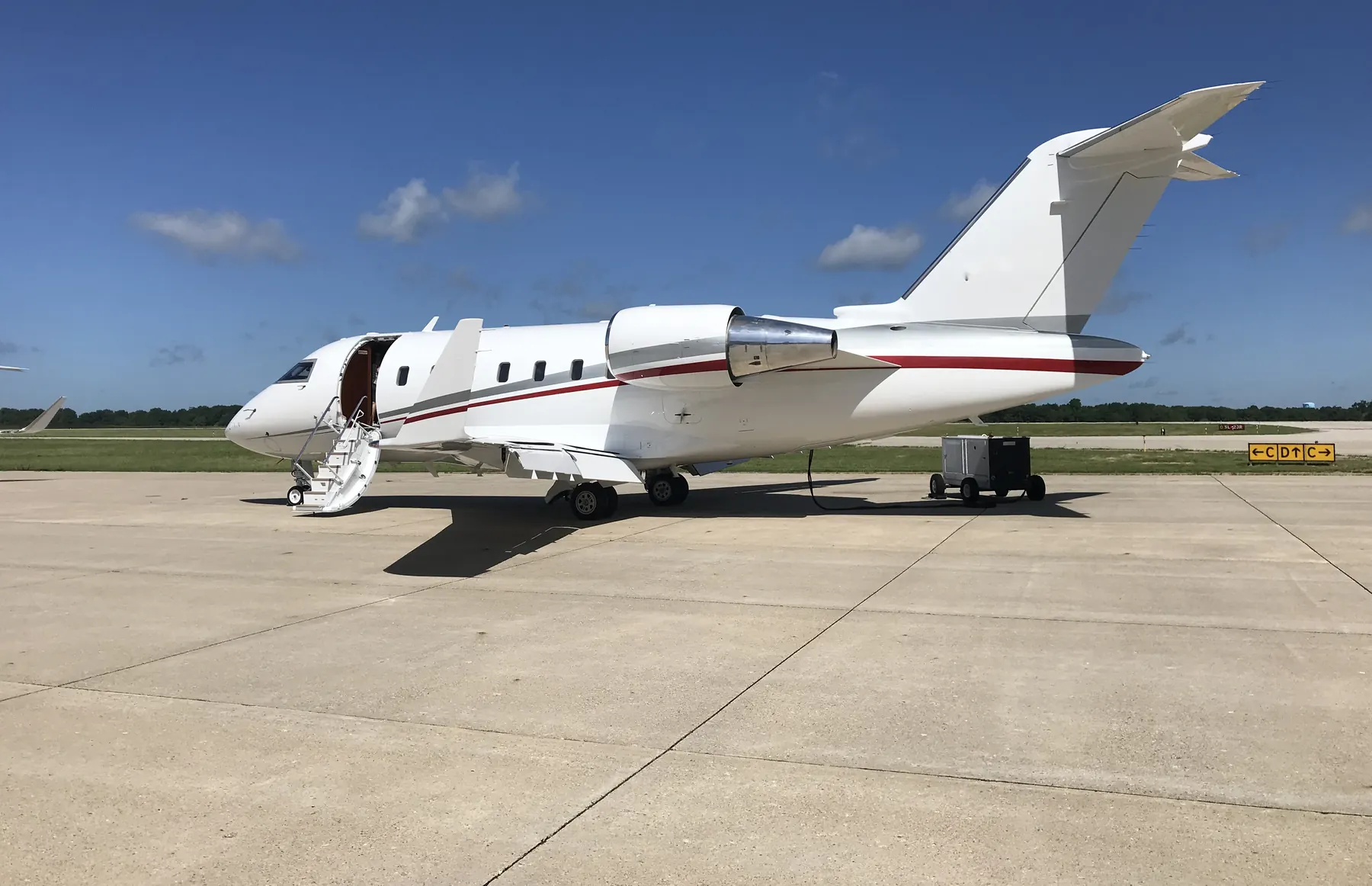 Bombardier Challenger on the ramp with its airstair down