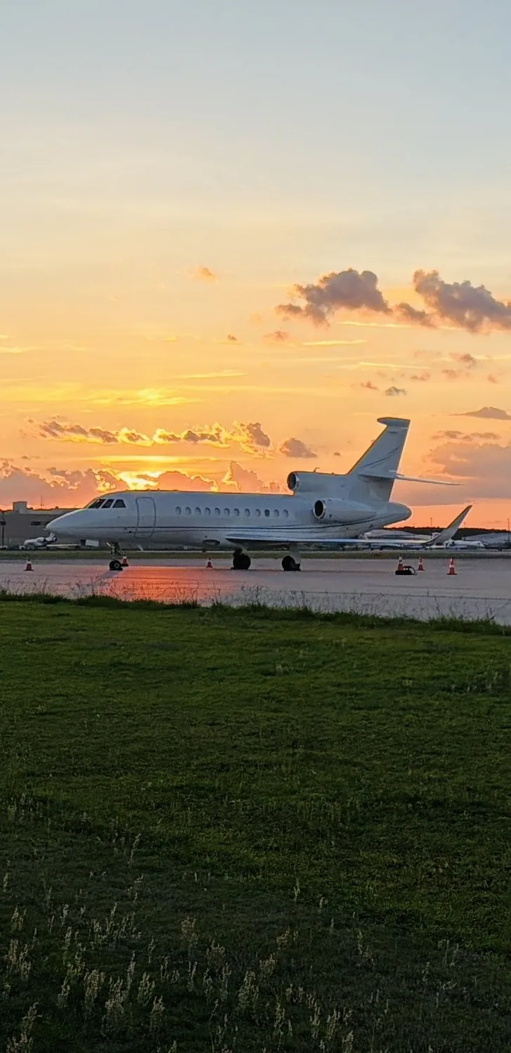 Dassault Falcon 900 on the ramp at sunset